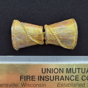 Vintage gold tone roped scarf clip